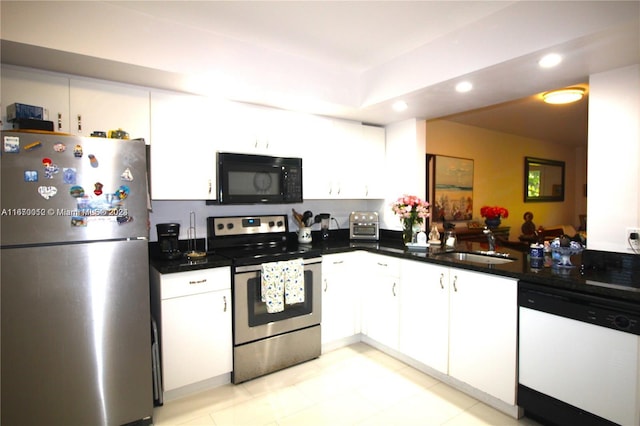 kitchen with sink, stainless steel appliances, and white cabinets