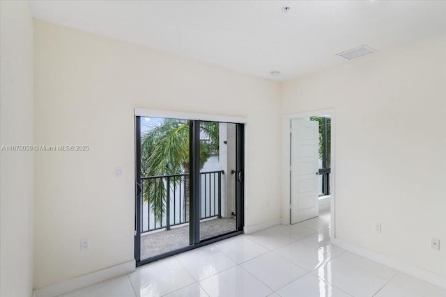 view of tiled spare room