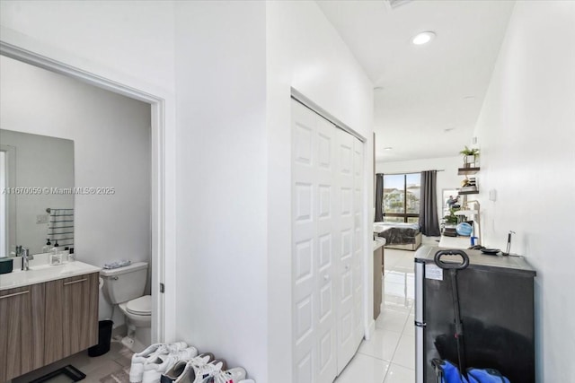 4636 NW 84th Ave Unit 47, Doral, FL 33166 - bathroom featuring tile patterned floors, vanity, toilet, and ensuite bathroom