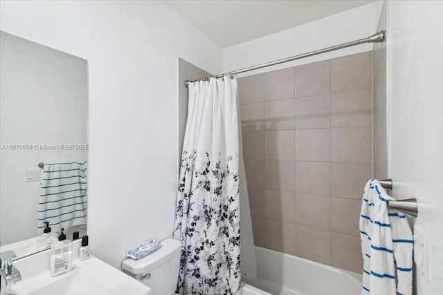 full bathroom featuring toilet, sink, and shower / tub combo