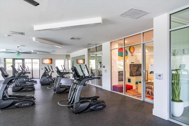 workout area with ceiling fan