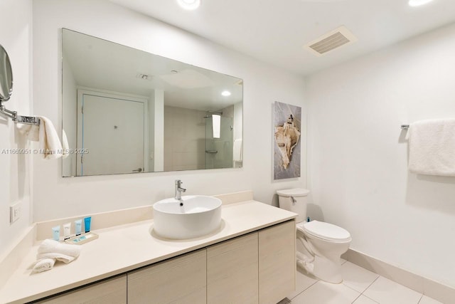 full bathroom featuring tile patterned flooring, visible vents, toilet, a stall shower, and vanity