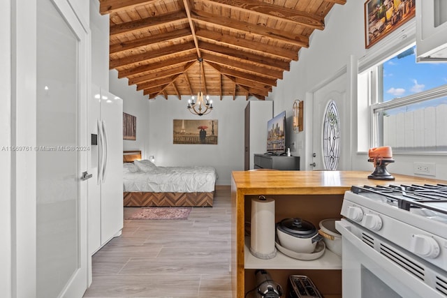 bedroom with an inviting chandelier, wood ceiling, light hardwood / wood-style floors, and lofted ceiling with beams