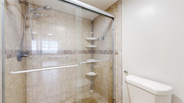 bathroom with toilet and walk in shower