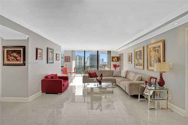 living room featuring floor to ceiling windows and crown molding