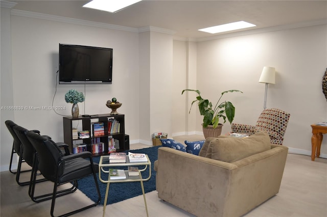 living room with light wood-type flooring and crown molding