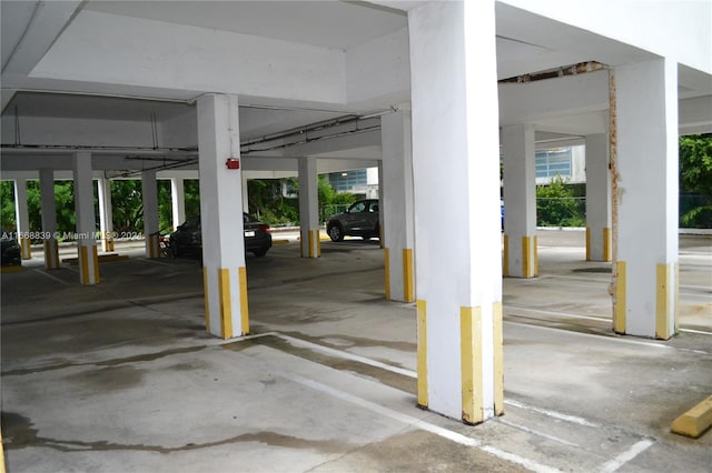 garage featuring a carport