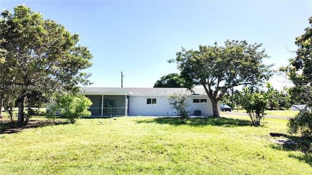 view of yard featuring a sunroom