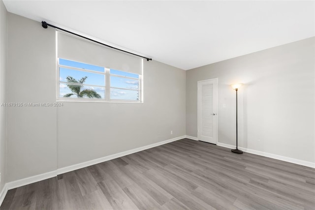 empty room featuring hardwood / wood-style flooring