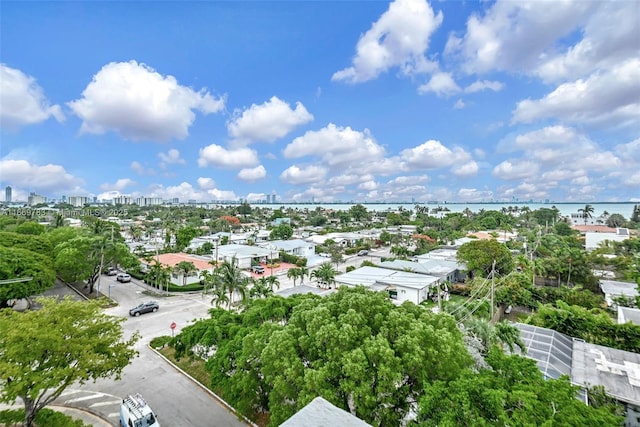 drone / aerial view with a view of city and a water view