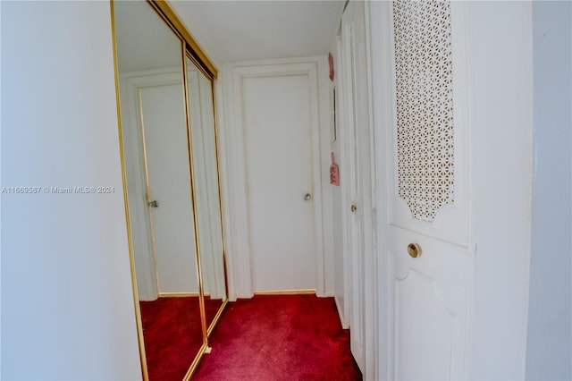 corridor featuring carpet floors