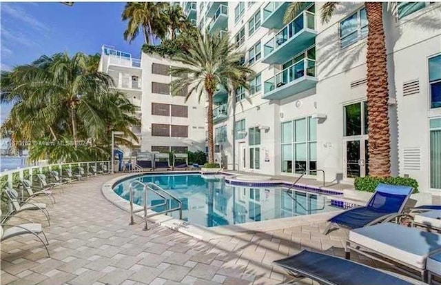 view of pool with a patio