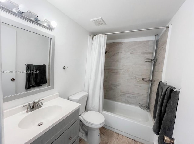 full bathroom with vanity, toilet, and shower / bath combo