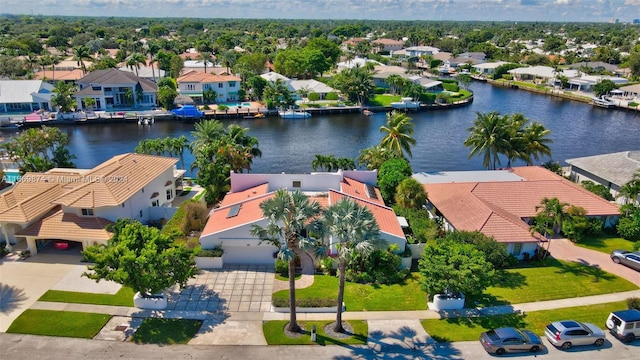 birds eye view of property featuring a water view