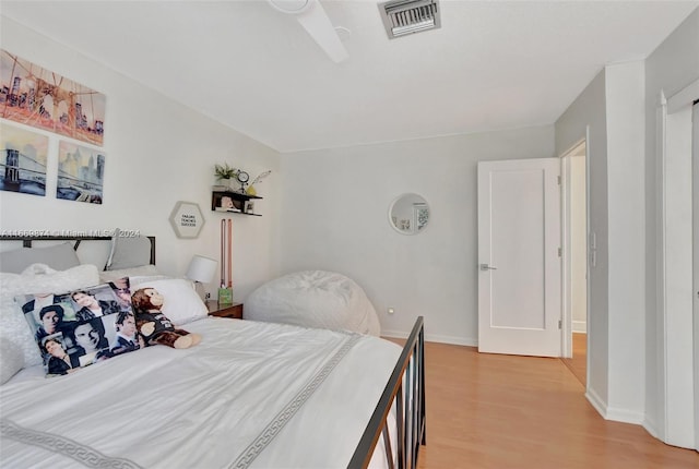 bedroom with light wood-type flooring