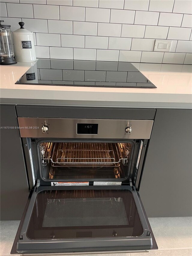 interior details featuring black electric cooktop