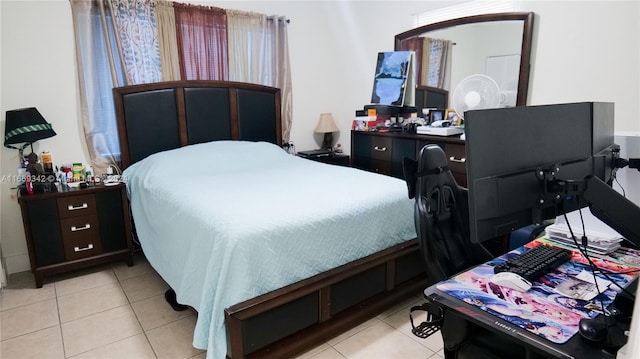 bedroom featuring light tile patterned floors