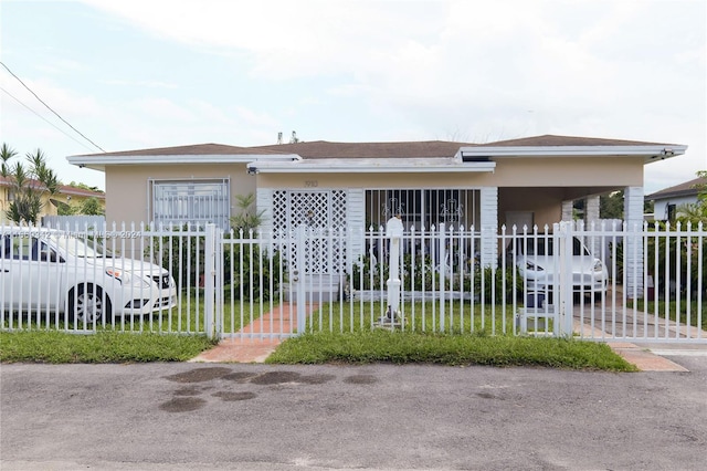 view of front of house featuring a carport