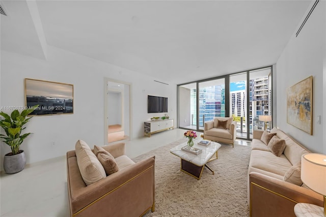 living room with floor to ceiling windows