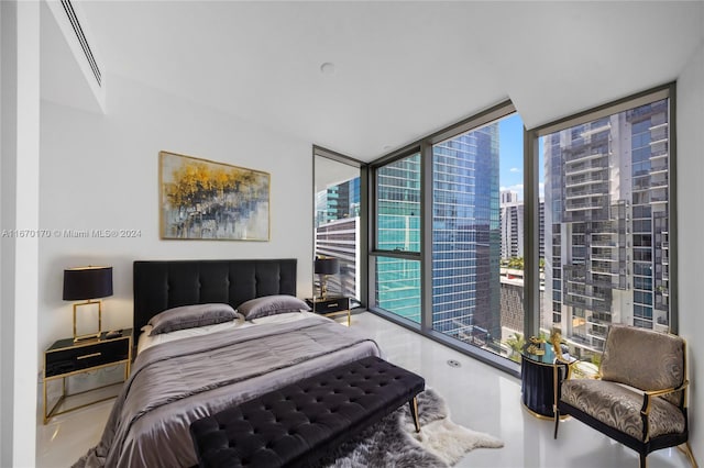 bedroom featuring a wall of windows