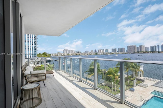 balcony featuring a water view