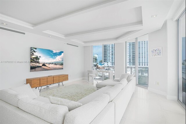 living room with floor to ceiling windows