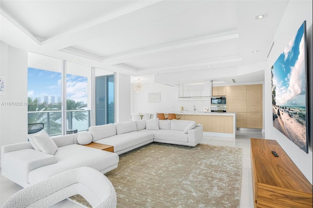 living room with floor to ceiling windows, a wealth of natural light, light tile patterned floors, and an inviting chandelier