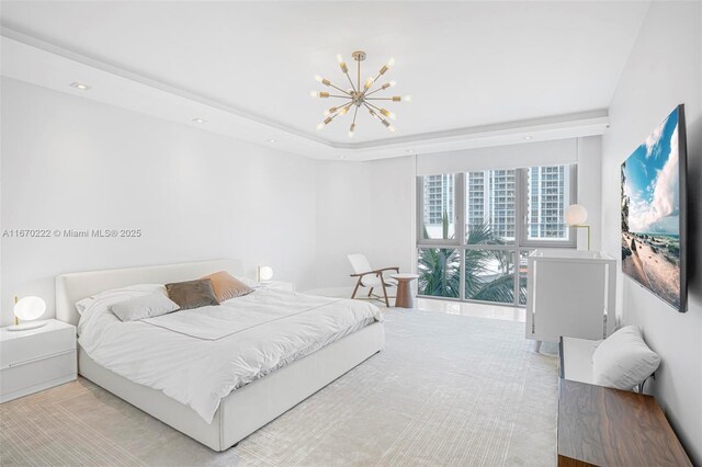 bedroom with a notable chandelier