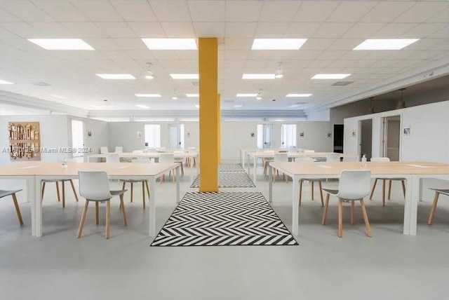 dining space featuring a paneled ceiling