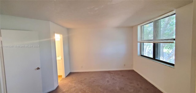 215 Lake Pointe Dr Unit 210, Oakland Park, FL 33309 - empty room featuring carpet floors and baseboards