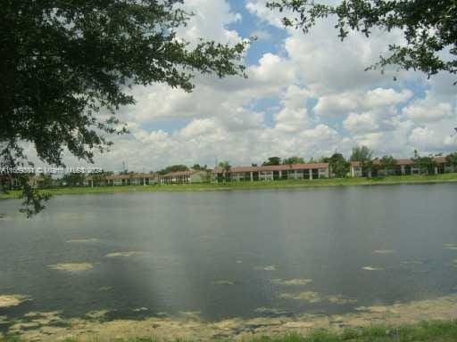 215 Lake Pointe Dr Unit 210, Oakland Park, FL 33309 - view of water feature