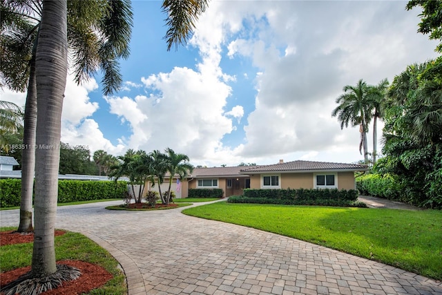 view of front of home with a front lawn