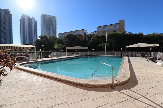 210 172nd St Unit 332, Sunny Isles Beach, FL 33160 - community pool featuring a patio