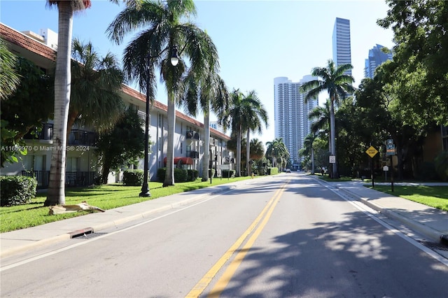 210 172nd St Unit 332, Sunny Isles Beach, FL 33160 - view of asphalt street with sidewalks, traffic signs, and curbs