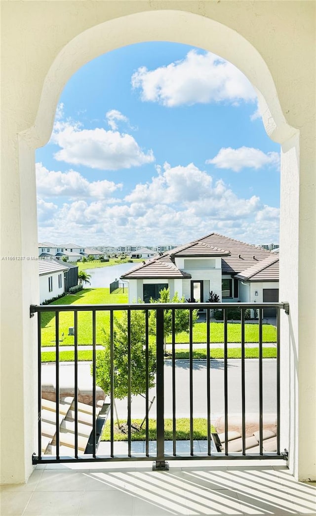 balcony featuring a water view