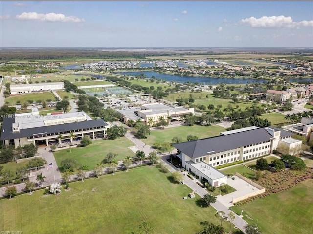 bird's eye view with a water view