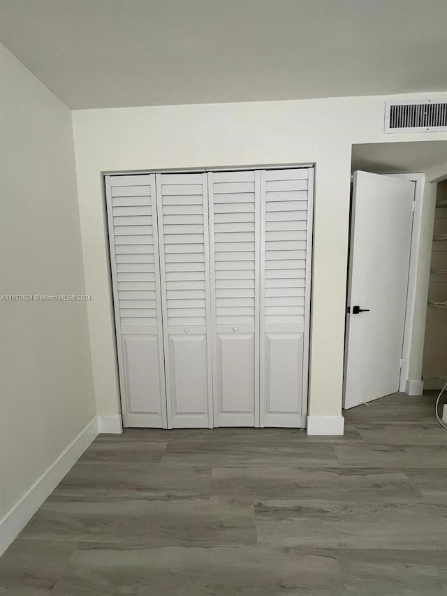 unfurnished bedroom featuring light hardwood / wood-style floors