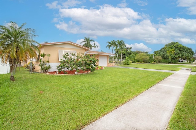 view of yard featuring a garage