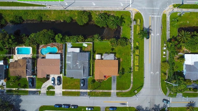 bird's eye view with a water view