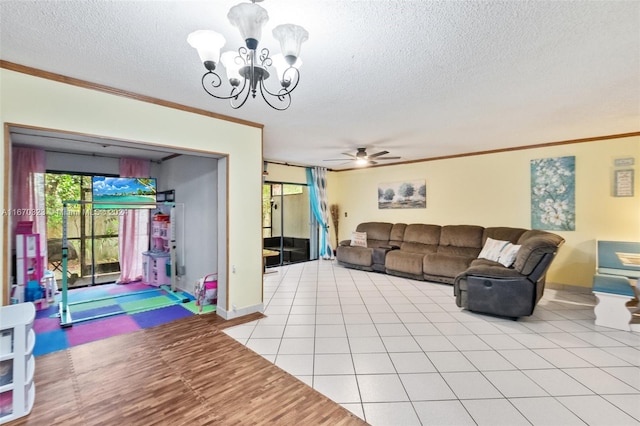 tiled living room with crown molding, a textured ceiling, and ceiling fan with notable chandelier