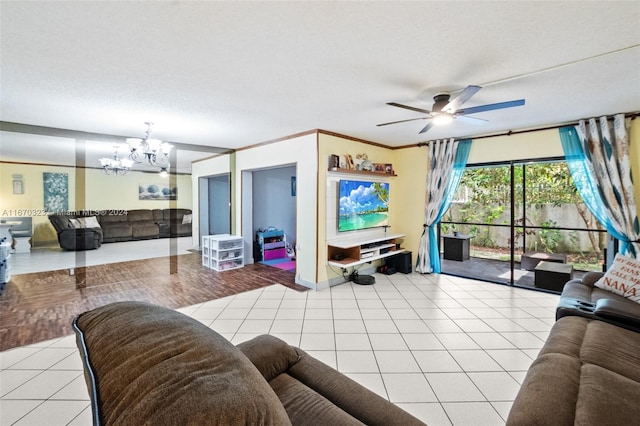 tiled living room featuring ornamental molding, a textured ceiling, and ceiling fan with notable chandelier