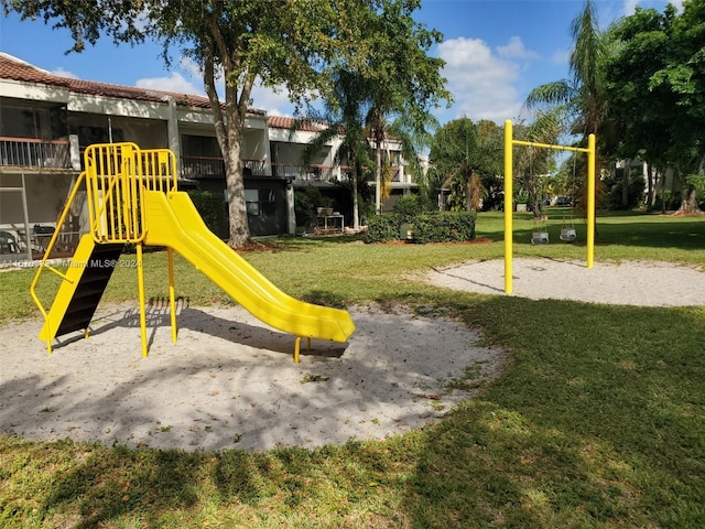 view of jungle gym featuring a yard