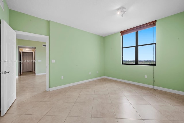 view of tiled empty room