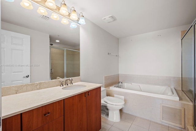 full bathroom featuring tile patterned flooring, separate shower and tub, vanity, and toilet