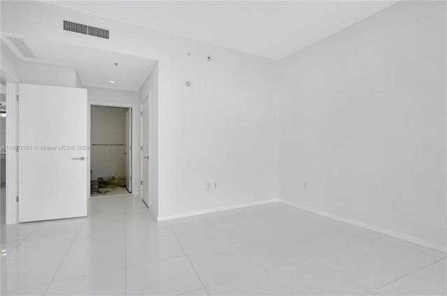 851 NE 1st Ave Unit 2200, Miami, FL 33132 - empty room featuring baseboards and tile patterned floors