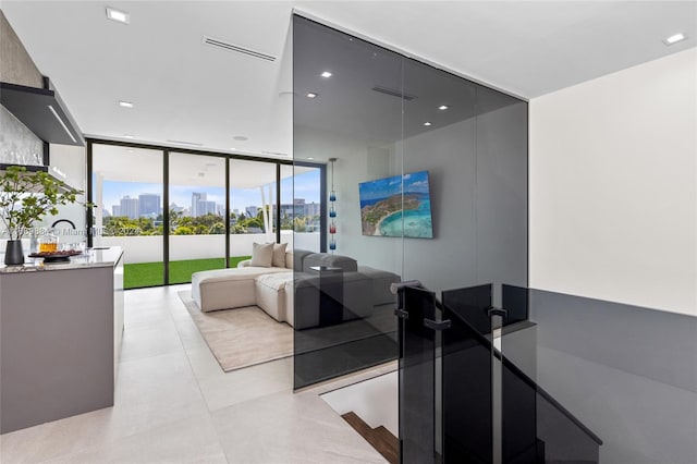 living room with a wall of windows