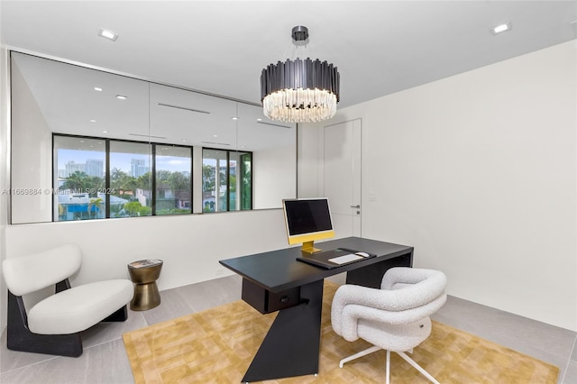 office area with an inviting chandelier and a wall of windows