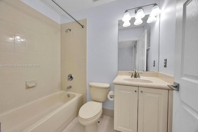 full bathroom with tiled shower / bath combo, vanity, toilet, and tile patterned floors