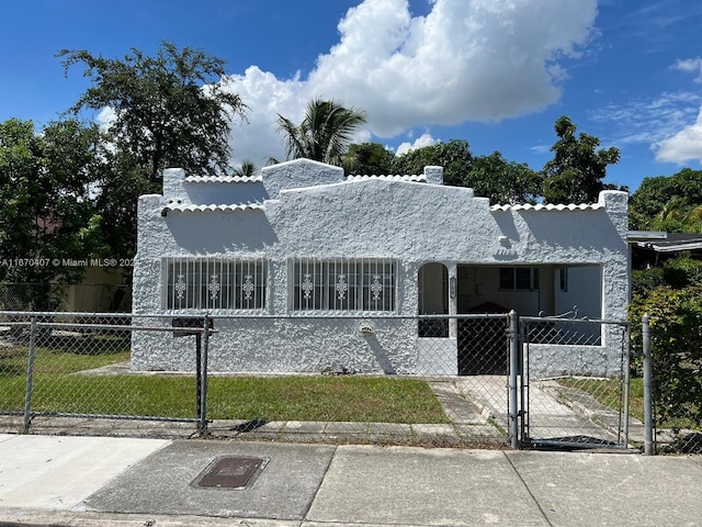 view of front facade with a front yard