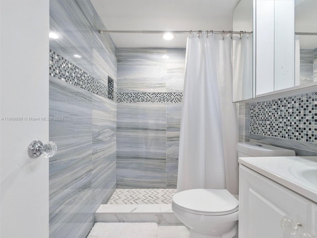 bathroom with a shower with shower curtain, tile walls, vanity, and toilet